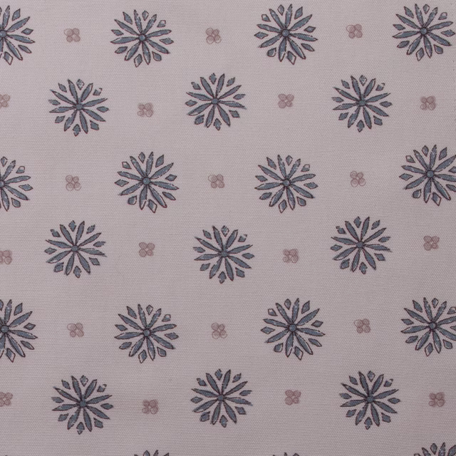 Pale ivory printed cotton with small blue-grey floral medallions and tiny blush motifs
