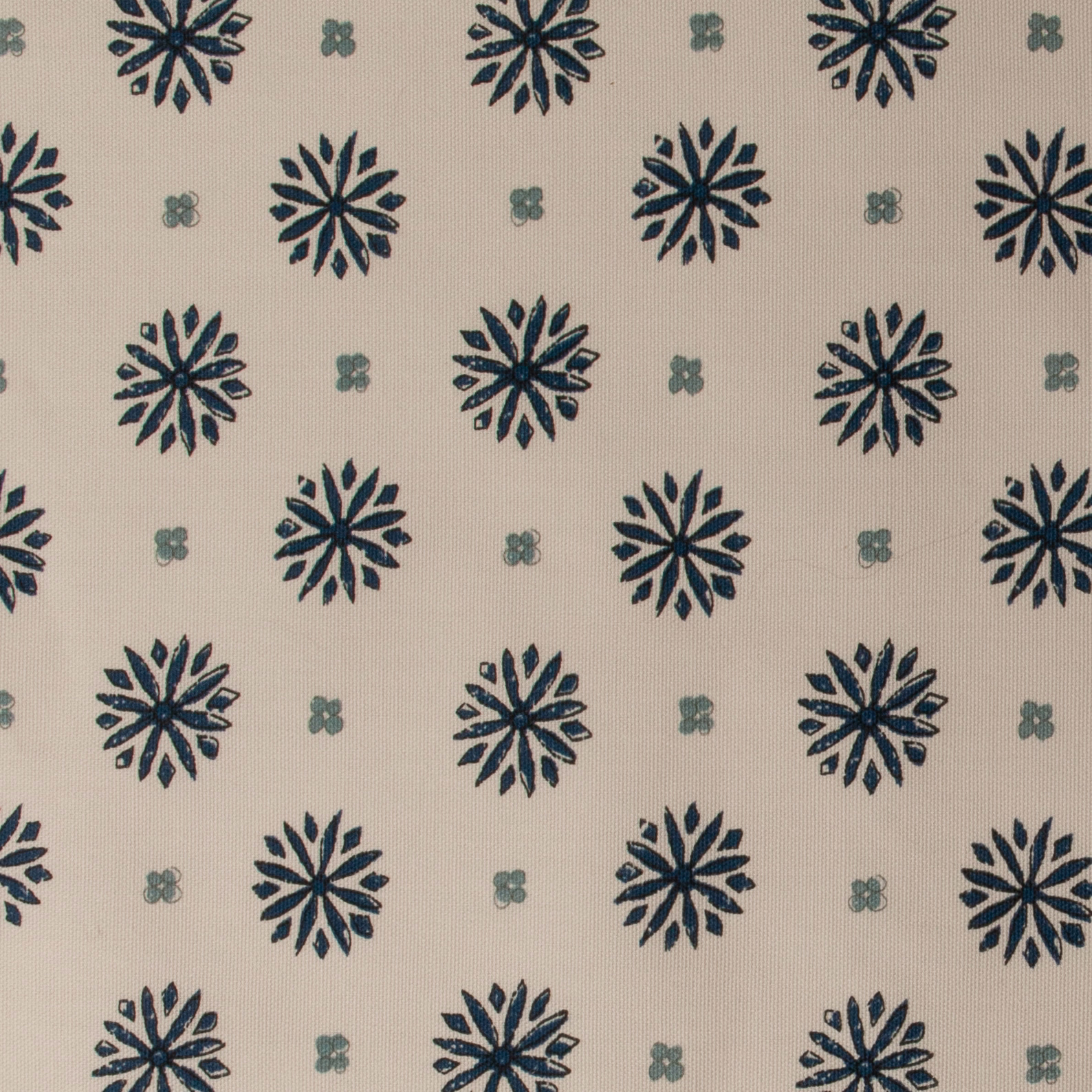 Cream printed cotton with indigo floral motifs and small sage accents