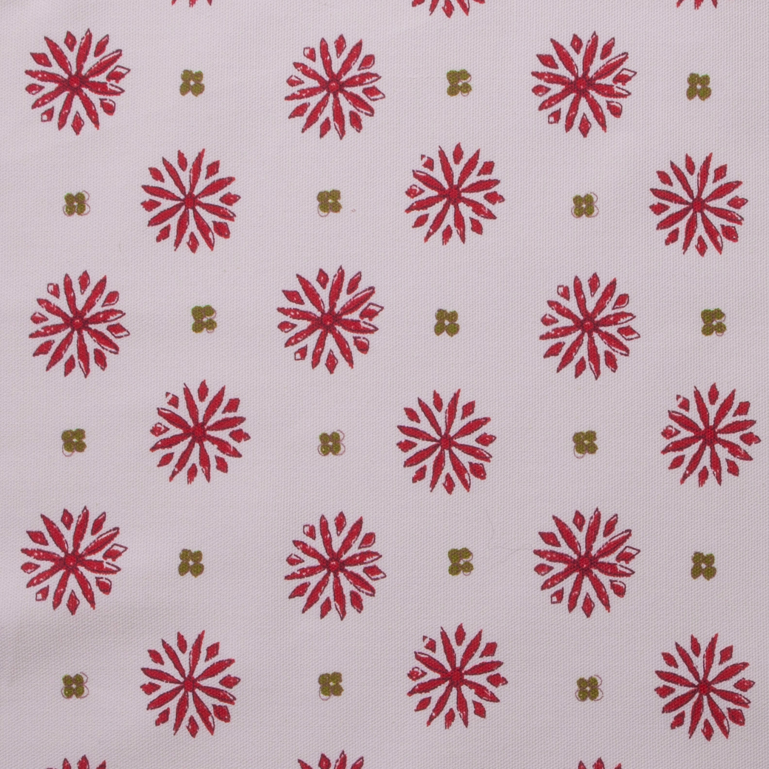 Pale cotton print with scarlet daisy motifs and small olive dots