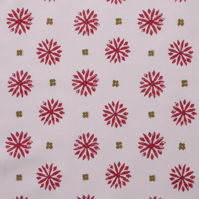 Pale cotton print with scarlet daisy motifs and small olive dots