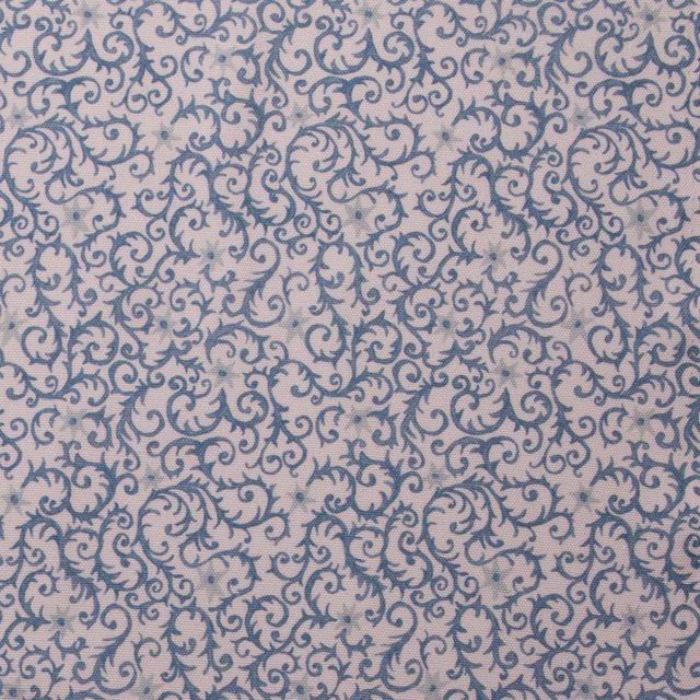 Aqua blue scrolling damask print on a pale cotton ground