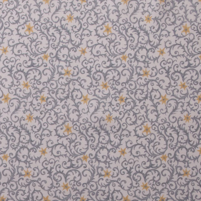 Pale cotton print with grey scrolling filigree and ochre star motifs