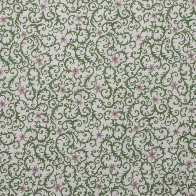 Olive green scrolling filigree print with small mauve star motifs on pale cotton
