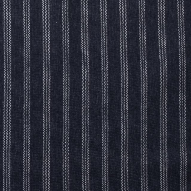 Dark indigo cotton fabric with narrow vertical pale pinstripes