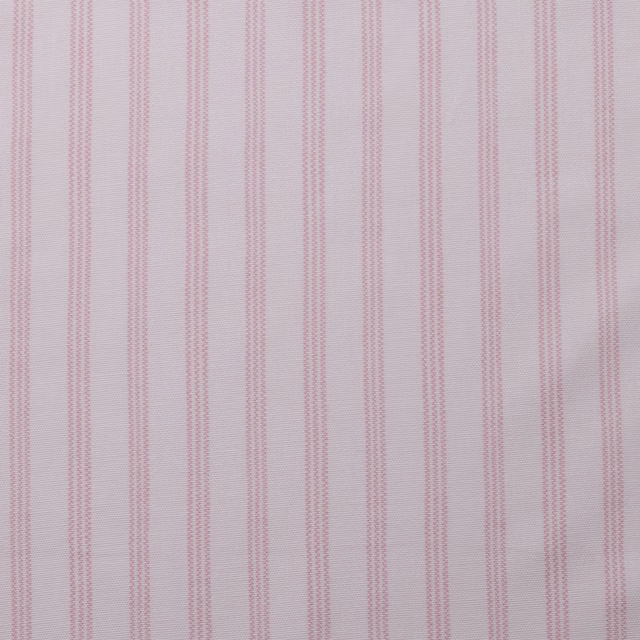 Pale blush pink pinstripe cotton print on a soft ivory ground