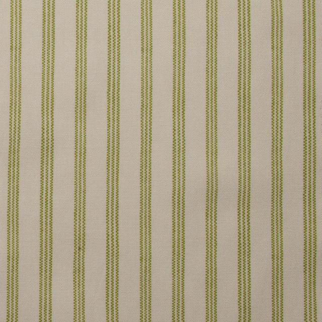 Close-up of cream cotton fabric with slim pistachio green vertical stripes