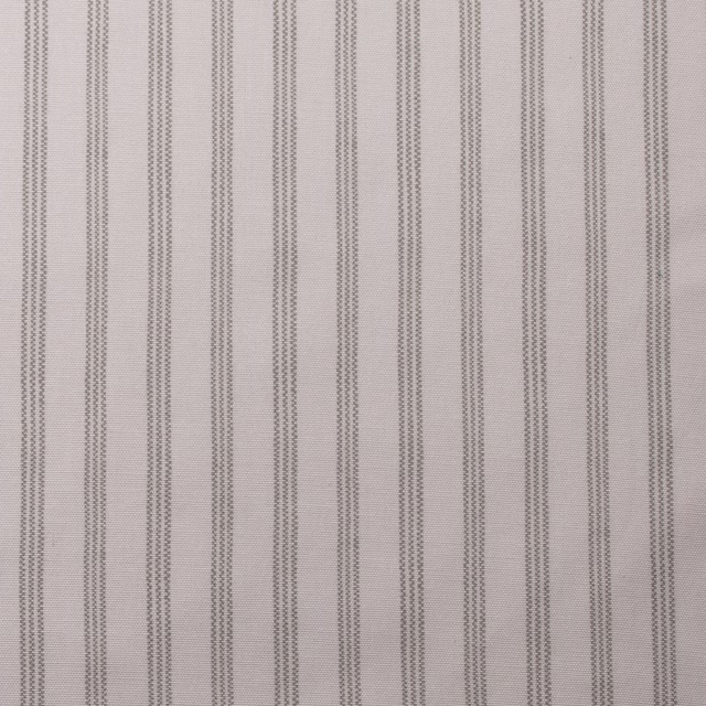 Pale silver-grey fabric with fine vertical pinstripes and a matte cotton finish