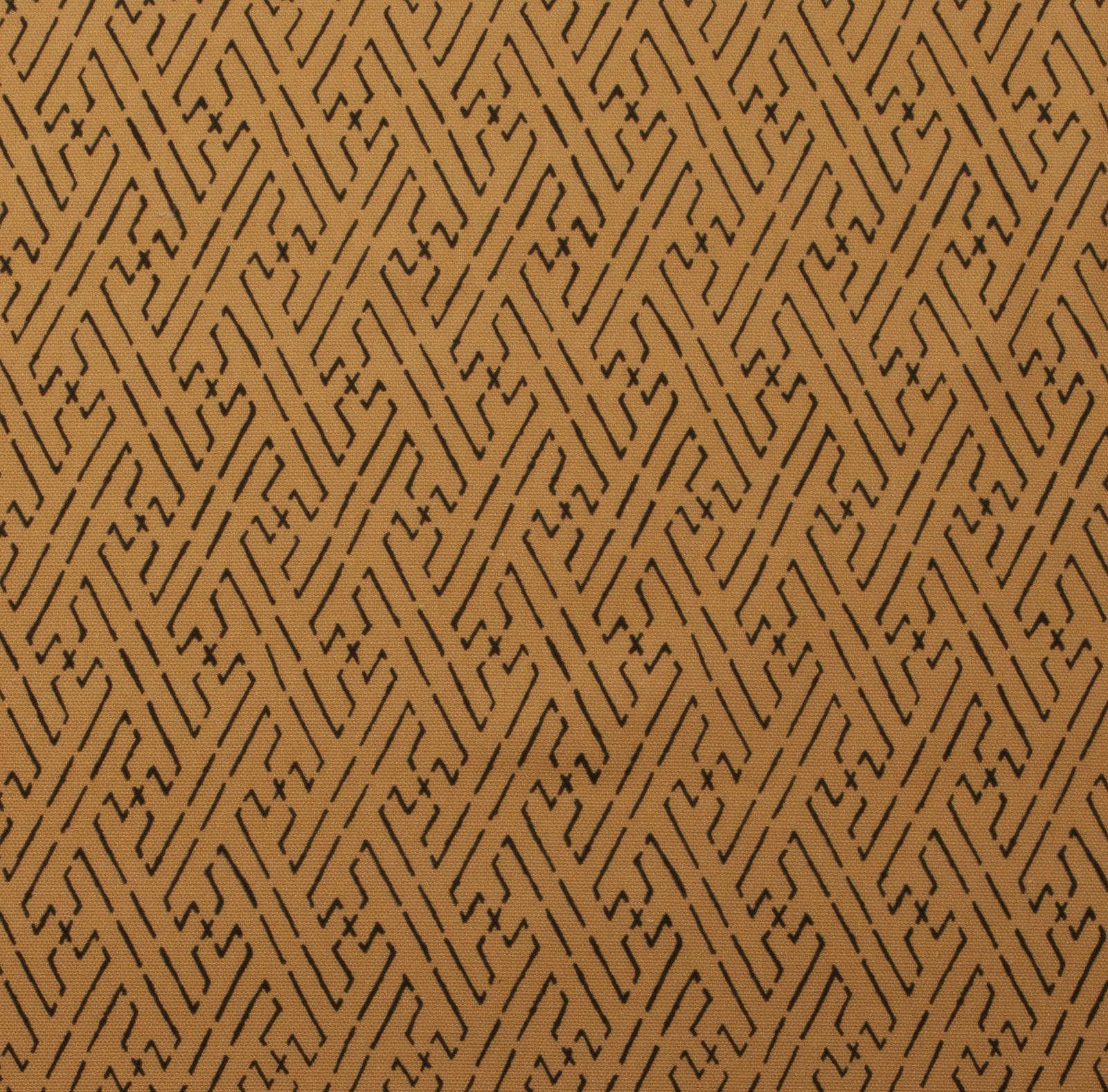 Buff beige fabric with dark linear trellis print in a repeating geometric pattern