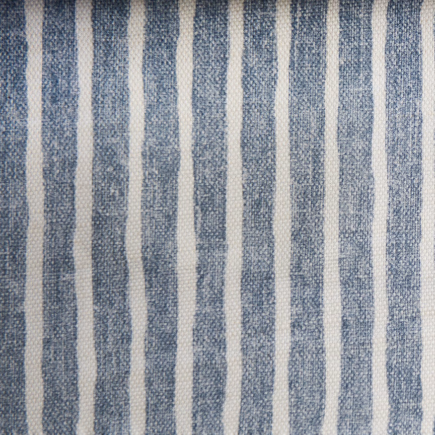 Close-up of indigo-blue and off-white vertical striped woven fabric
