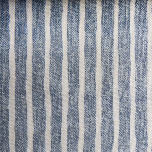 Close-up of indigo-blue and off-white vertical striped woven fabric
