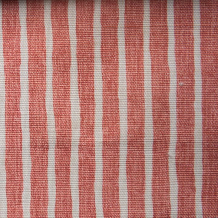 Coral-red vertical stripe fabric with pale ground and textured weave