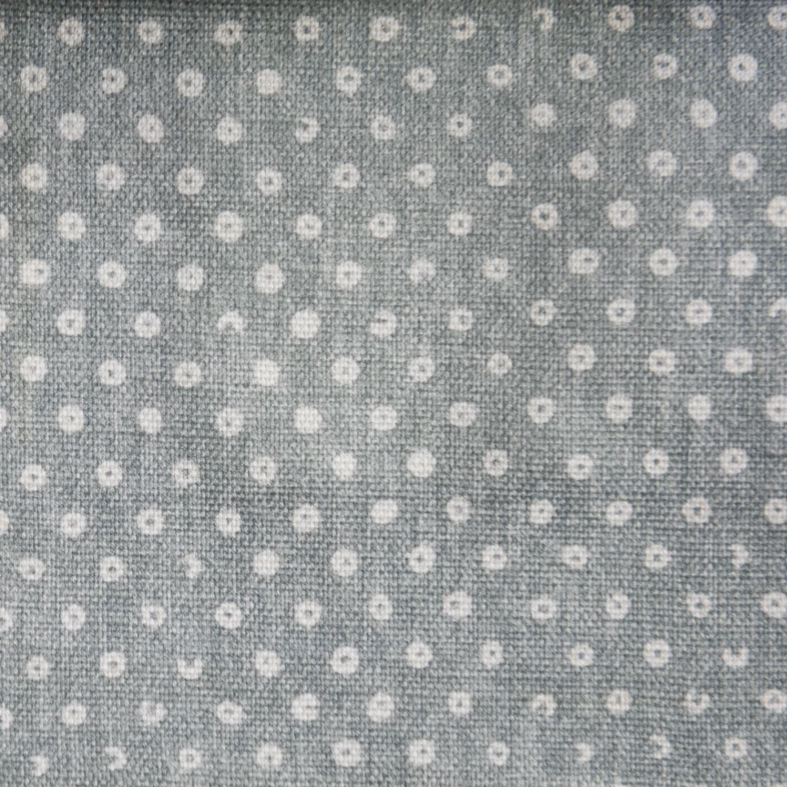 Soft sky-grey fabric with small cream-white dotted spot pattern