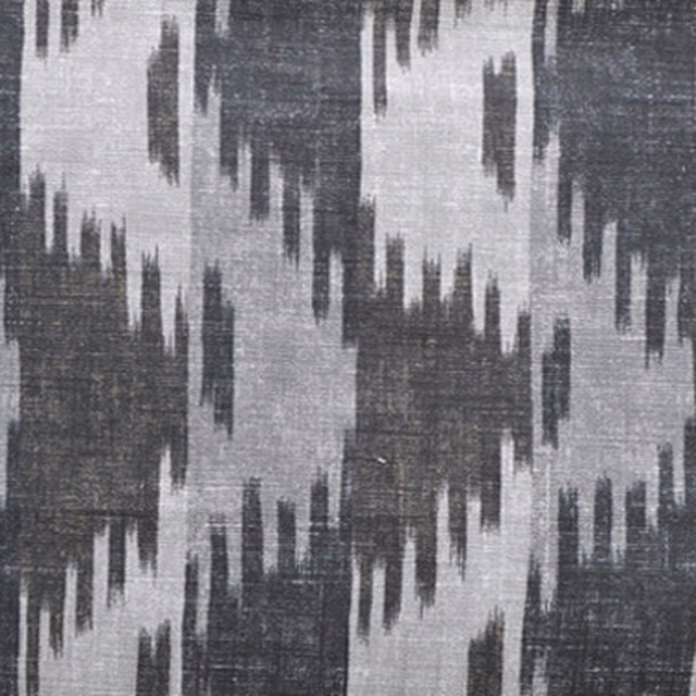 Charcoal and smoke grey ikat weave with large blurred zigzag stripes