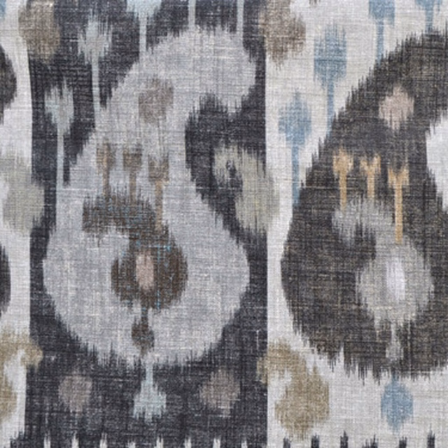 Large-scale charcoal and nutmeg ikat boteh swatch on a pale ground