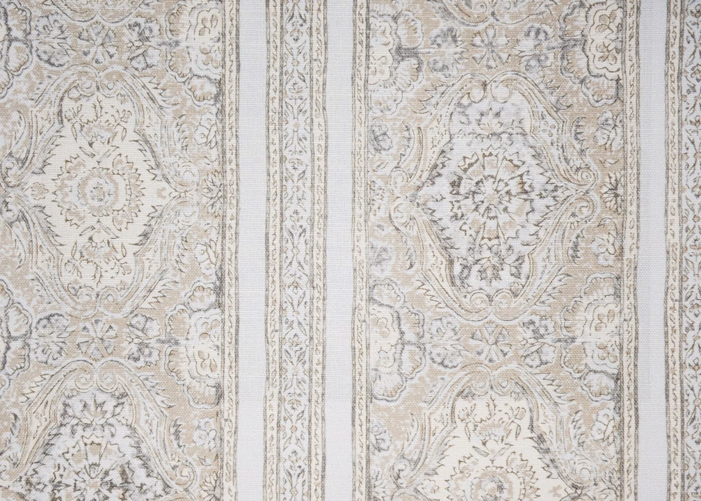 Pale dove and sand striped fabric with ornate woven medallion motifs