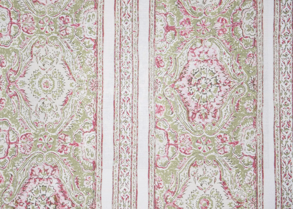 Pink and green striped Kalamkari fabric with ornate medallion motifs on an off-white ground