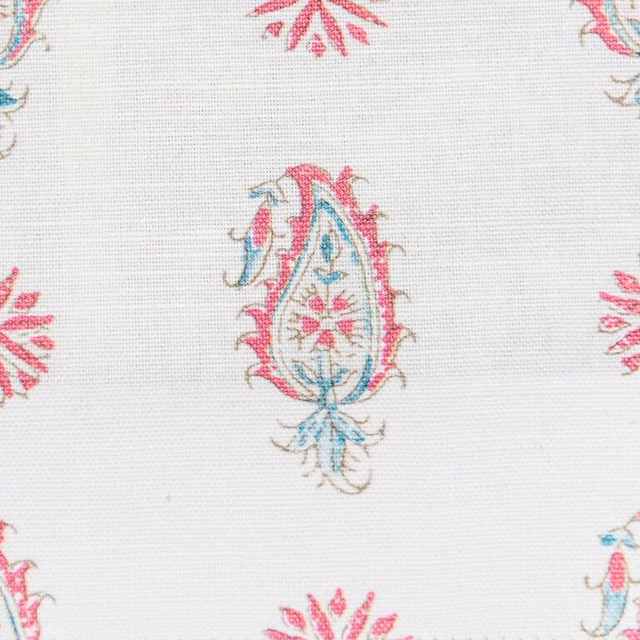 Ivory fabric swatch with small aqua and rose paisley motifs and fine weave