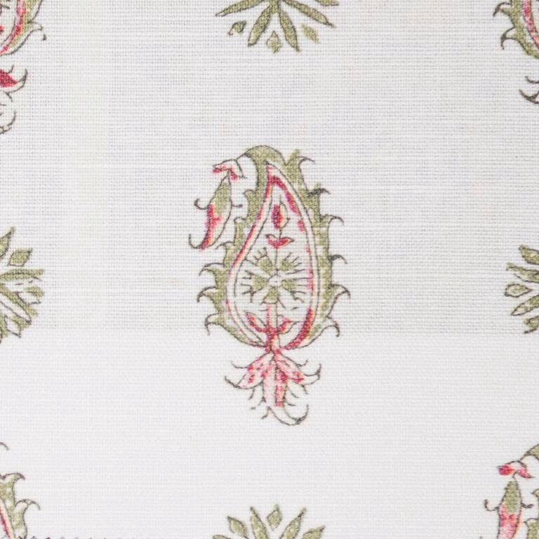 Small pink and sage paisley motifs on a pale woven fabric ground