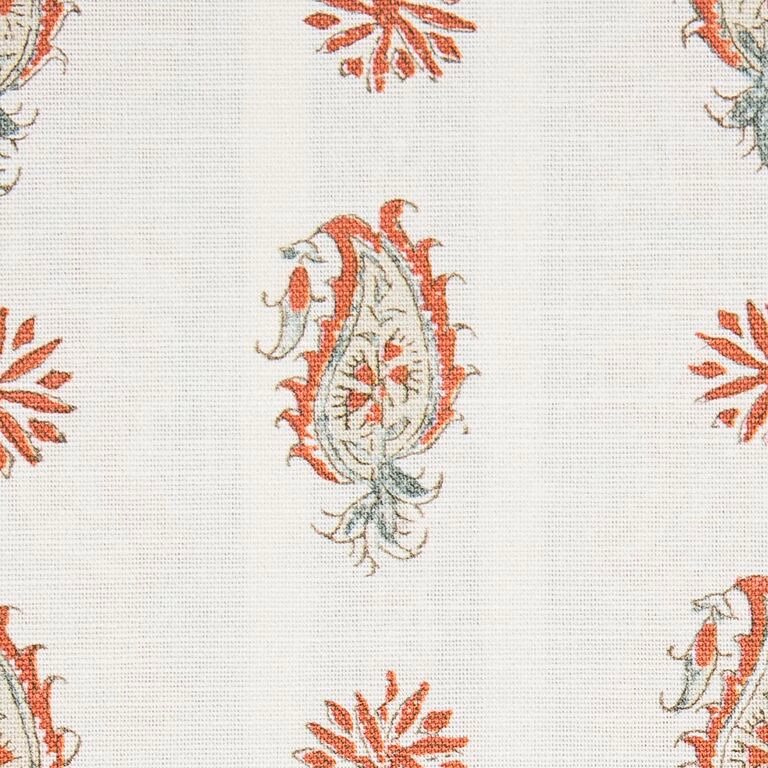 Terracotta and sage paisley motifs on a pale woven fabric ground