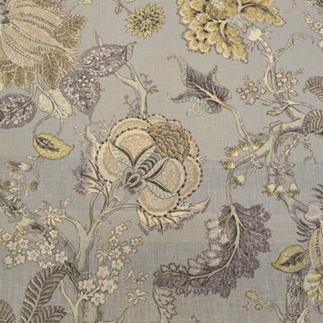 Large floral fabric swatch in soft blue-grey with cream, sage and dusky purple motifs