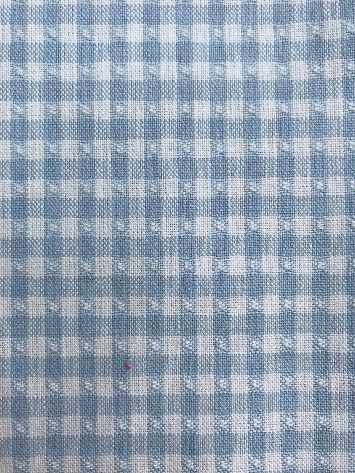 Pale aqua checked woven fabric with a textured slub finish