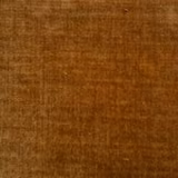 Warm caramel-brown velvet swatch with soft lustre and mottled pile
