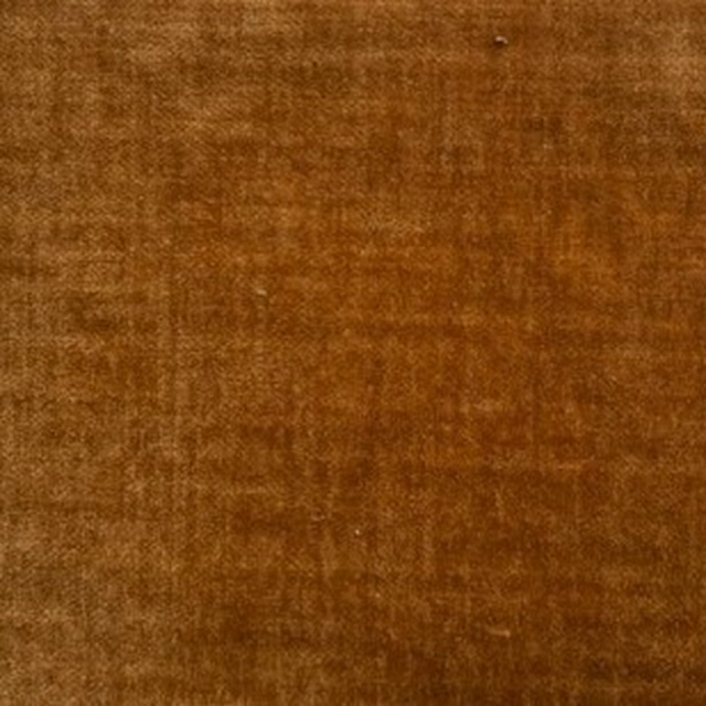 Warm caramel-brown velvet swatch with soft lustre and mottled pile