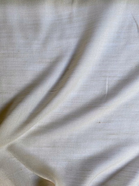 Pale cool grey sheer fabric with fine horizontal texture and soft folds