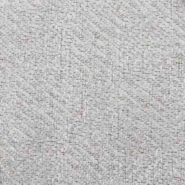 Close-up of a soft oyster cream textured fabric with a mottled weave