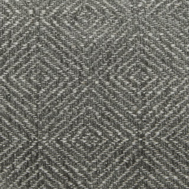 Close-up of a grey diamond-pattern woven fabric with textured yarns