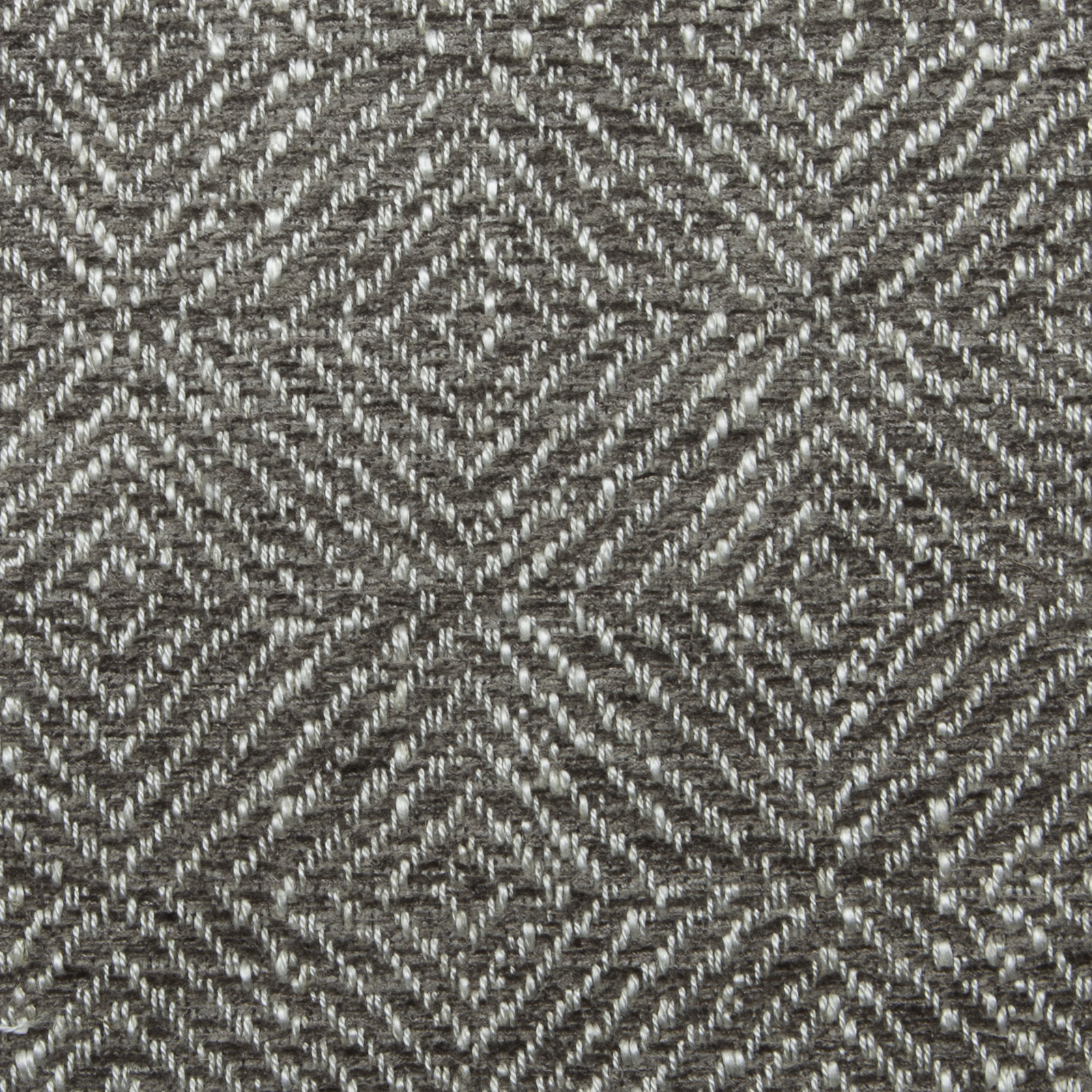 Close-up of taupe and grey woven diamond geometric fabric