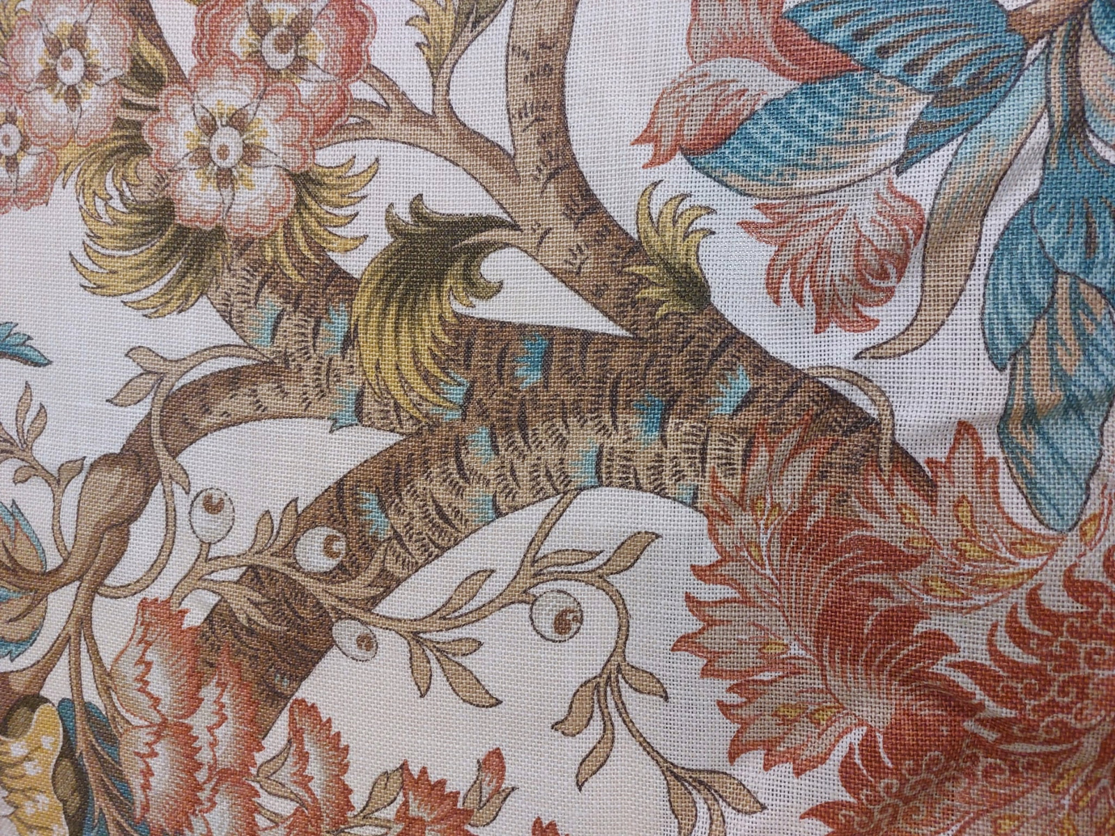 Large Tree of Life botanical swatch with coral, brown and teal details on cream ground