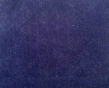 Close-up of deep indigo velvet with a soft, plush nap