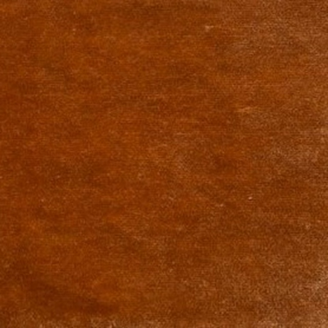 Burnt rust plain velvet swatch with soft, even pile