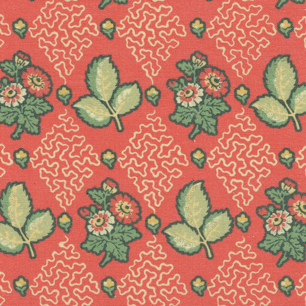 Coral red botanical fabric with green leaves and cream scrolling motifs