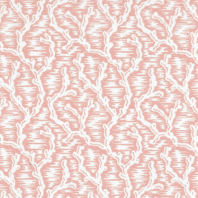 Coral pink fabric with white organic lattice motif and fine striated ground