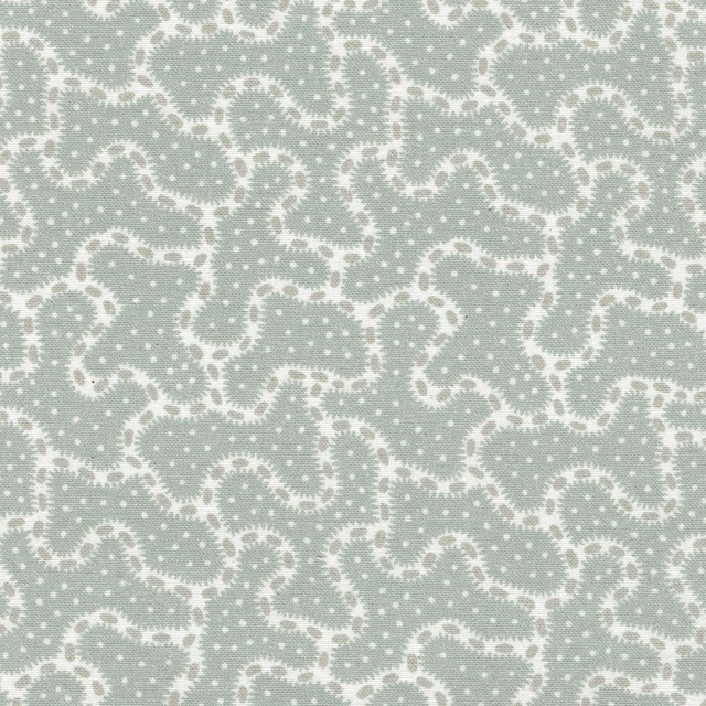 Soft sage green fabric with ivory trellis motif and tiny dotted texture