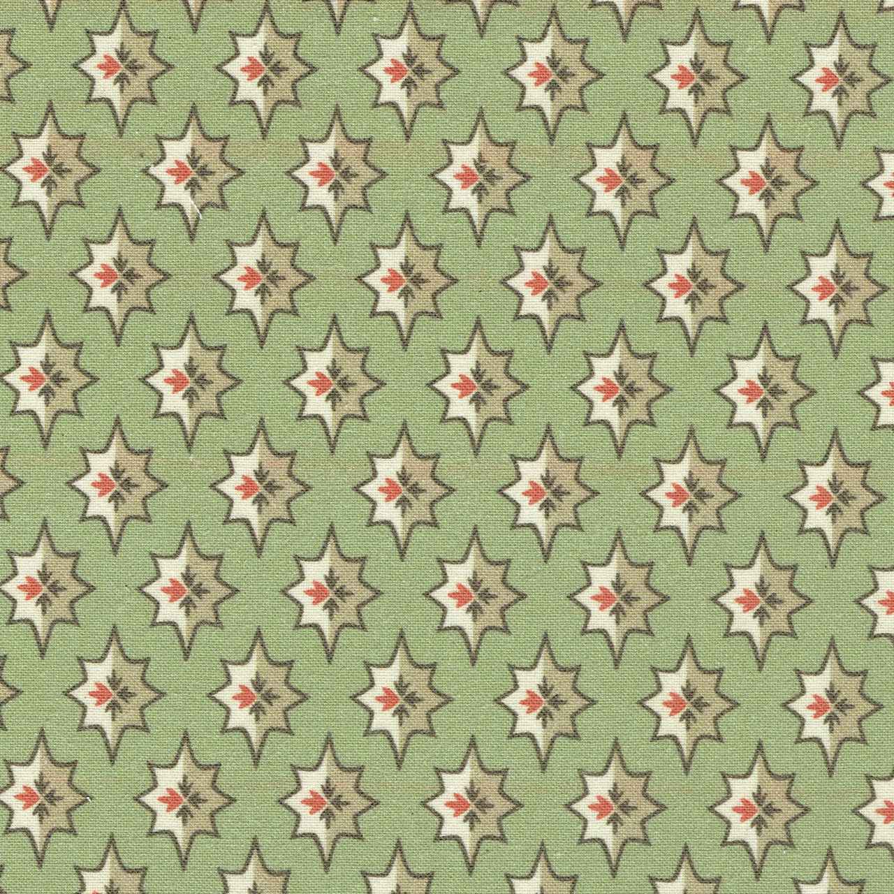 Sage green printed fabric with small star motifs and red accents