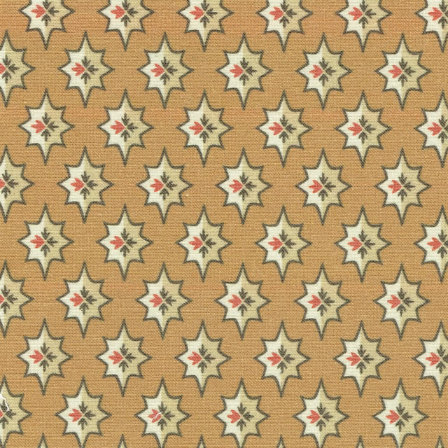 Warm sand beige fabric with small cream star motifs and red accents