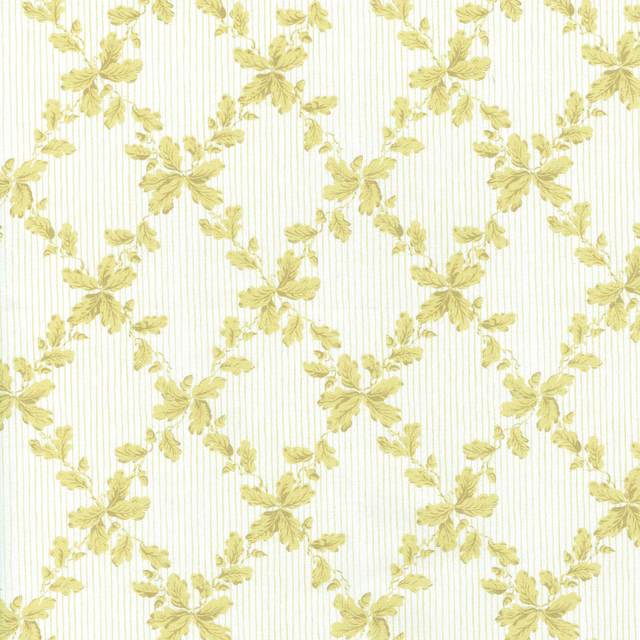 Pale yellow floral lattice print on a fine striped white ground