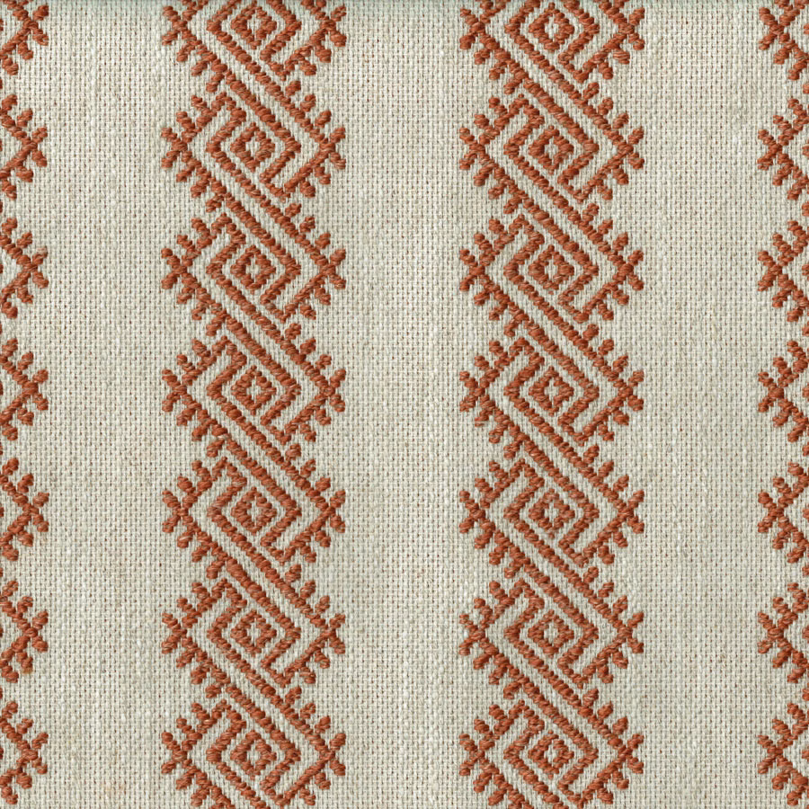 Terracotta diamond geometric woven fabric on a pale natural ground