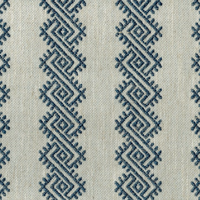 Cream woven fabric with vertical teal-blue geometric diamond motifs