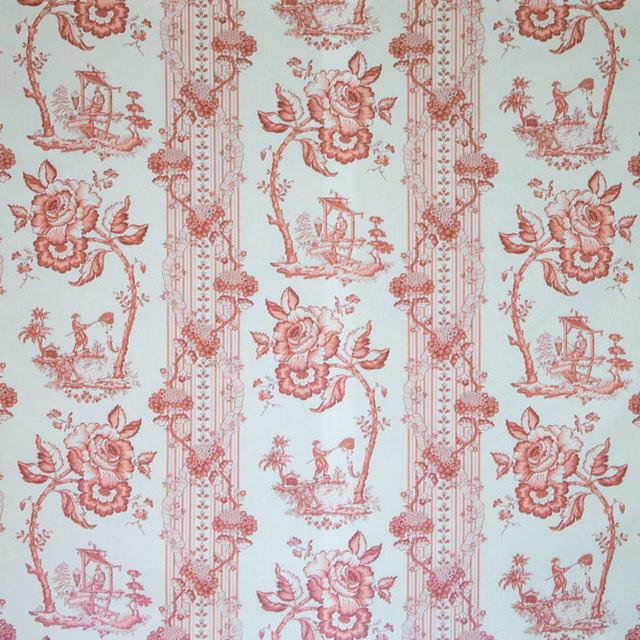 Red toile stripe fabric with floral sprays and scenic vignettes on a pale ground
