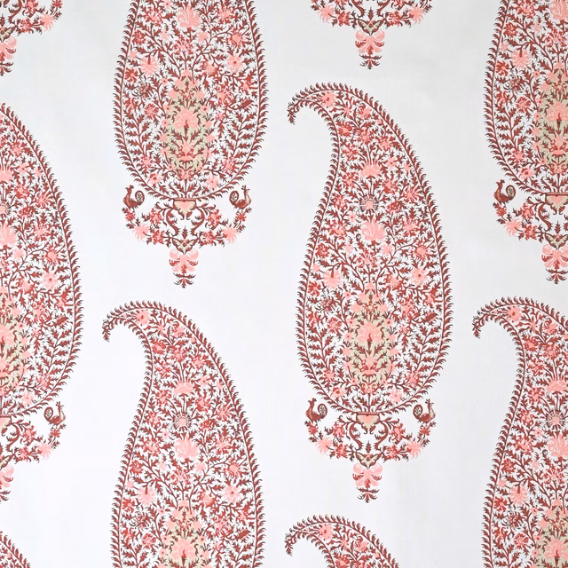 Large dusty rose paisley motifs on a pale cream ground