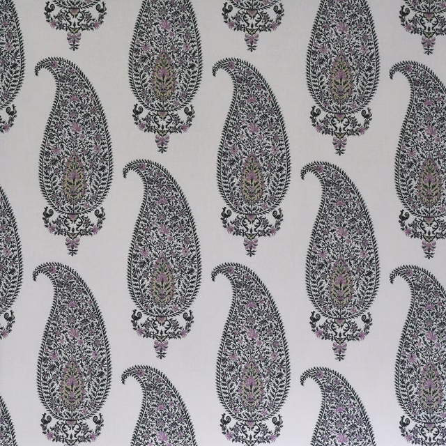 Pale fabric swatch with repeating paisley teardrops in mauve, lilac and dark detailing