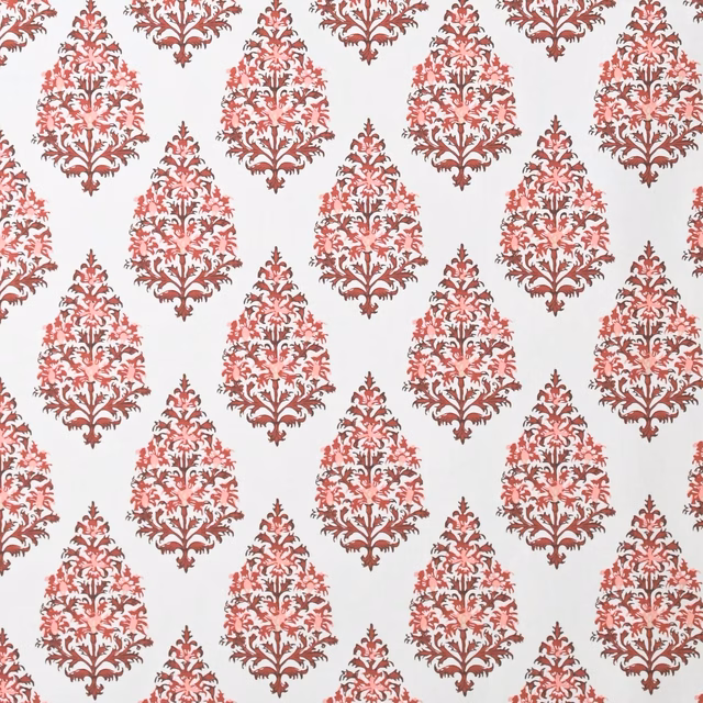 Dusty rose red damask motif on a pale off-white fabric ground