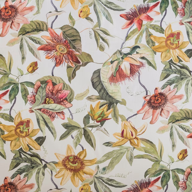 Autumn-toned passion flower print with coral, gold and green foliage on a pale ground