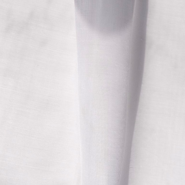 Soft ivory sheer curtain fabric with a fine, translucent weave