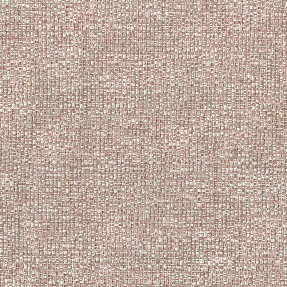 Close-up of a soft blush pink woven fabric with tiny speckled texture
