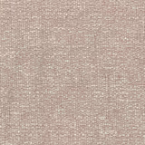 Close-up of a soft blush pink woven fabric with tiny speckled texture